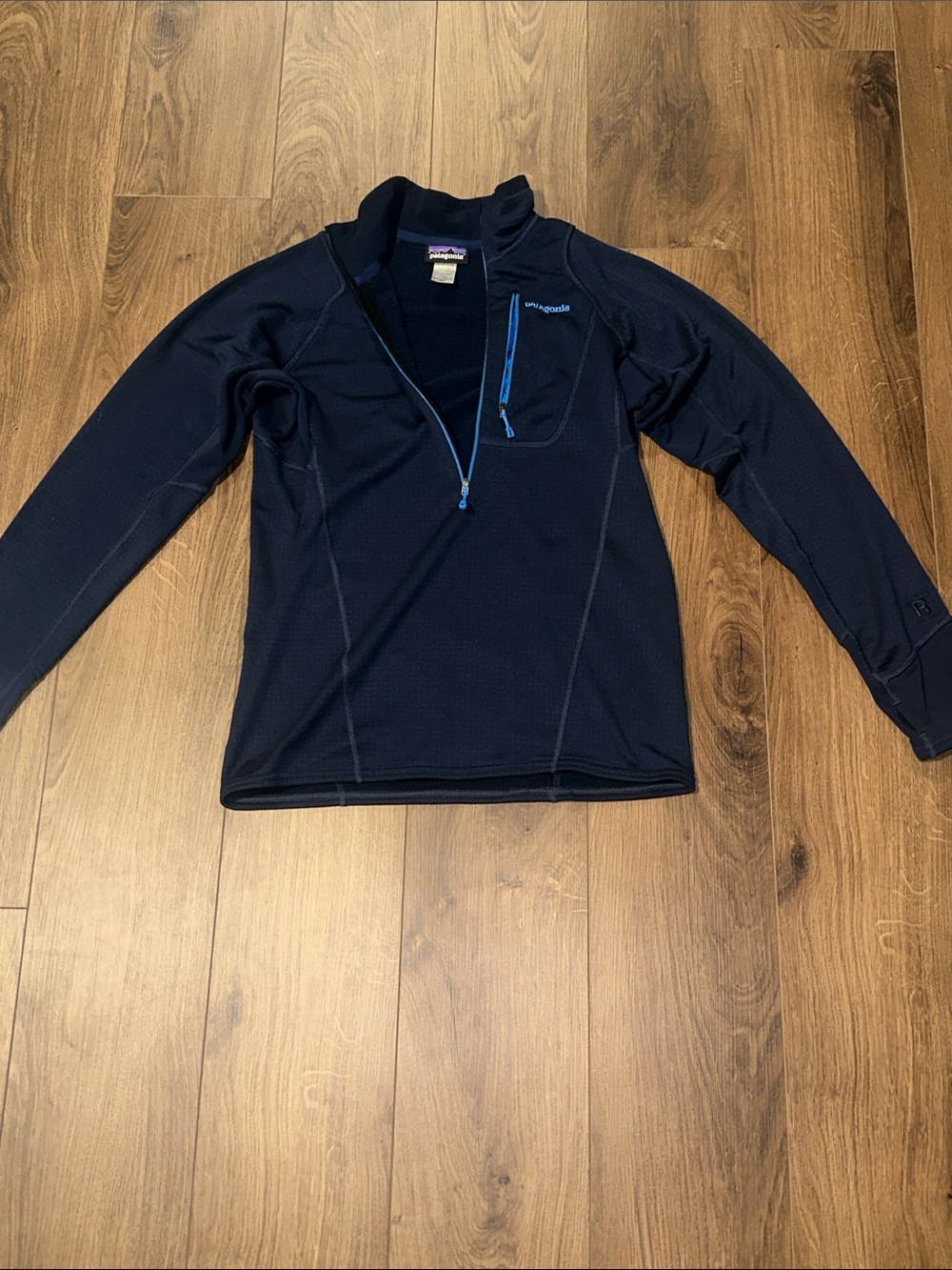 Patagonia Men's Navy Blue Long-Sleeve Rash Guard with Blue Zip Accents